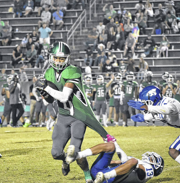 The Green Wave wins three in a row. More photos on page 10.
Courtesy photo