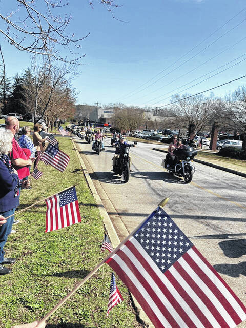 Central residents turn out with flags.
                                 Courtesy photo