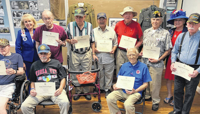 Front row, left, right, Norm Sutherby - US Navy, Frank Cantrell US Navy, Clint Beaver US Navy. Back Row, Carolyn, Nations, James Whiteley US Marines, Ernest MacAdoo US Army, Charlie Brewer US Navy, Wayne Wardlaw US Army, Harvey Spencer US Navy, Ann Warmuth, Bruce Maxwell US Army/US Air Force.
                                 Courtesy photos
