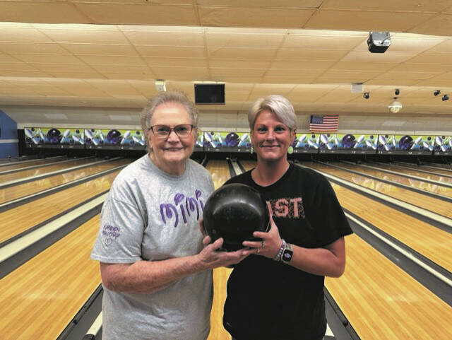 Debi Aiken and her daughter Adrienne are pictured last week at the Wednesday Night League at Tri City Lanes. Adrienne has piled up an outstanding bowling career.
                                 Courtesy photo