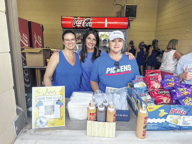 Pictured are Michelle Gagdalo, Jessica Burnett and Christina Kelley last Friday night working at the concession stand. All three are helping lead the way to the first Booster Club for Pickens High School.
                                 Courtesy photo