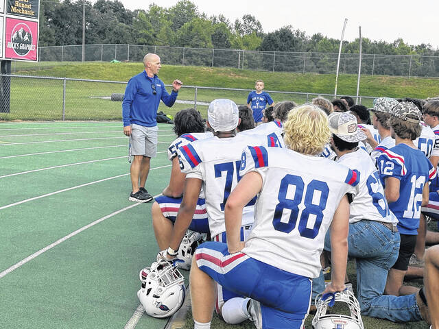 Pickens High School football coach James Reynolds talks to his team last week in Easley at the Jamboree. Reynolds and his team will be hosting rival Easley High School on Friday night.
Jeff Holt | The Easley Progress