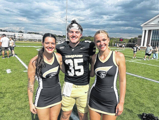 Pictured are Easley High School grads Jorja Fox, Carter Owen and Makayla Arnold on Saturday after Anderson Universitys 51-14 win over St. Andrews. It marked the first-ever football game for Anderson University. Not pictured is EHS alum Courtney Smith.
Jeff Holt | The Easley Progress