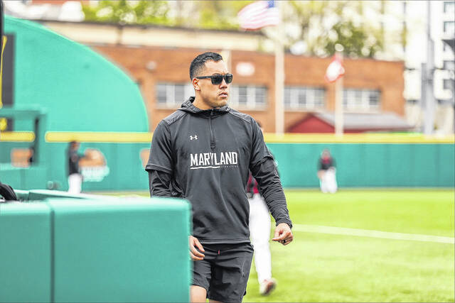 Pictured is Easley High School weightlifting instructor Justin Houng during his days at the University of Maryland. Coach Justin has played a key part in getting all of the athletes stronger at EHS.
                                 Submitted Photo