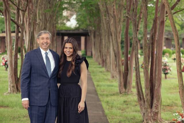 Pictured is Anna Robinson with her dad Chris who lead the way for Robinson Funeral Home.
                                 Submitted Photo