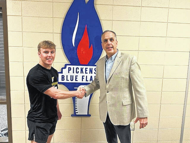 Pictured is Pickens High School senior Carter McCollum, The Easley Progress 2024-25 Football Player of the Year, and Sports Editor Jeff Holt.
Photo Submitted