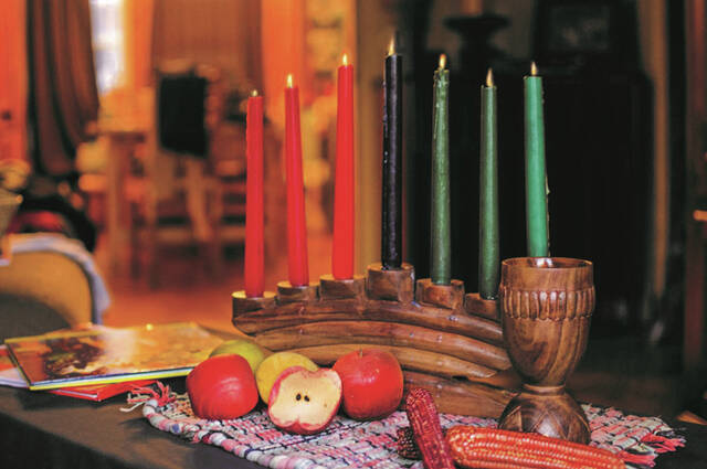 The candles represent African gods.
                                 File photo