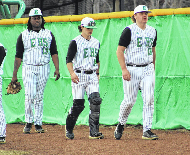 Pictured is Easley catcher Aaron Tolbert (center) with pitchers Trey Sutton (left) and Zach Jochimsen (right) before the game last week. The 1-2 punch of Sutton and Jochimsen led the way in Easleys win over JL Mann. Tolbert has provided that senior leadership at catcher for the Green Wave.
                                 Photo courtesy of Alicia Tolbert