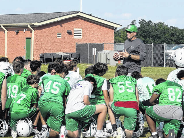 Brock Rodgers talks to his group of rising freshman football players on Thursday afternoon after spring practice. Rodgers has been promoted from an eighth-grade coach to a JV assistant coach this season.
Jeff Holt | The Easley Progress