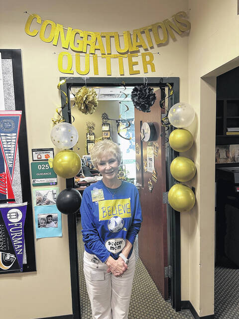 Pictured is Easley High School counselor Amy Moore recently after her coworkers gave her a retirement party.