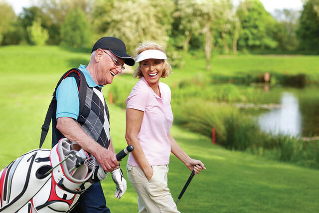 Seniors who play golf, particularly those who walk the course instead of using a cart to get around, can reap the rewards of walking, including improved cardiovascular health. (File photo).