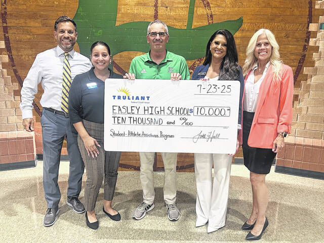 Pictured is Easley High School Athletic Director Gill Payne and members of Truliant Federal Credit Union. The EHS athletic department is getting a major boost of $10,000 from Truliant Federal Credit Union.
Jeff Holt | The Easley Progress
