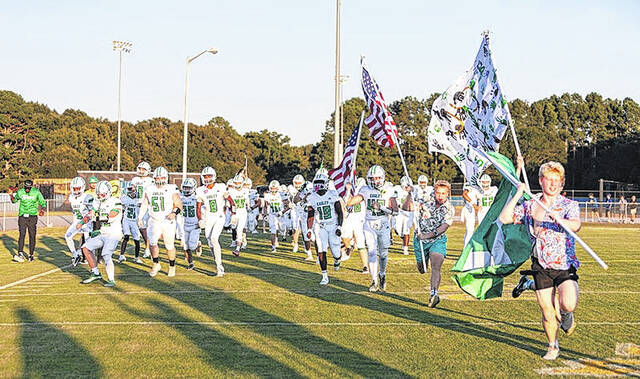 The Green Wave take the field.
Mark Beery | The Easley Progress