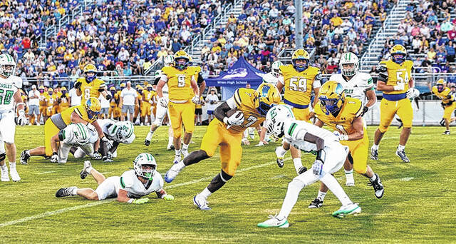 The Easley defense tries to contain the ground game of Wren with the talented runningback Muntu Brown.
Mark Beery | The Easley Progress