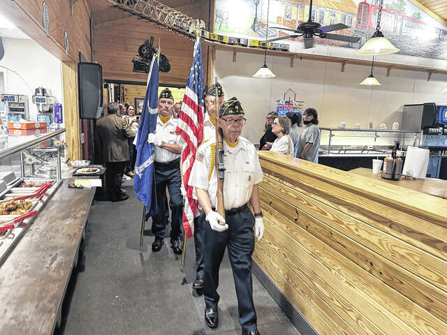 Barry Harrow leads the Post 52 Honor Guard recently at a local luncheon. They will also be performing at the Easley Veterans Day Parade.
                                 Jeff Holt | The Easley Progress