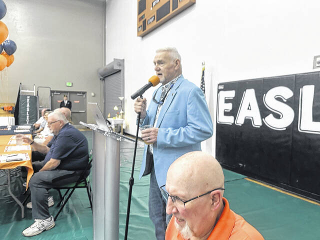 Pictured is Steve Garrison with the Invocation to the Easley Post 52 Hall of Fame Induction banquet on Friday night at the Larry Bagwell Gymnasium. Garrison starred at first base for Post 52 and he also helped put on this big event.
Jeff Holt / The Easley Progress